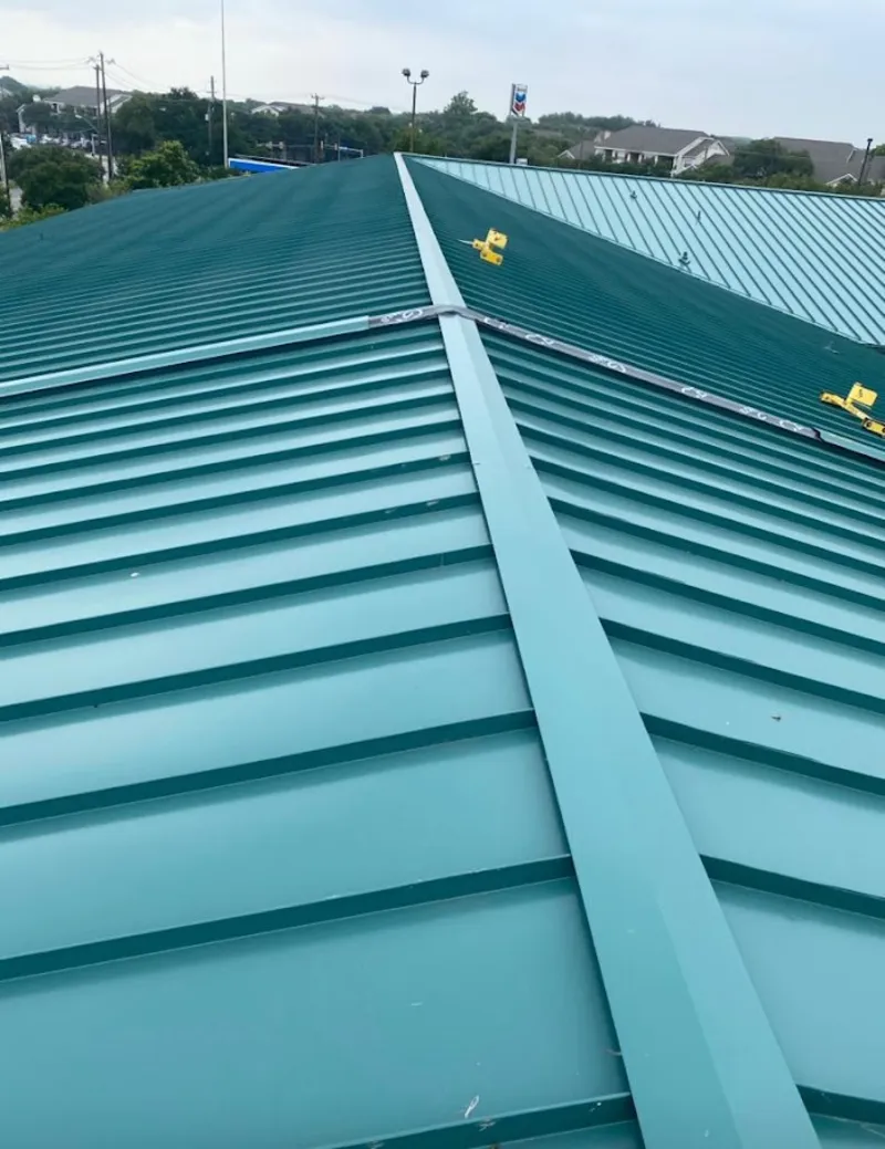 Green commercial metal roof ridge and valley for Metal Roof Repair in Richmond Hill