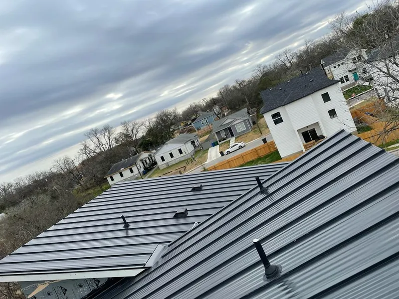 Standing seam metal roof panels with vents for Skylight Repair in Richmond Hill